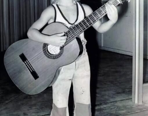Can You Guess Which Country Star This Childhood Photo Belongs To?: Nicole Kidman Once Saved His Life